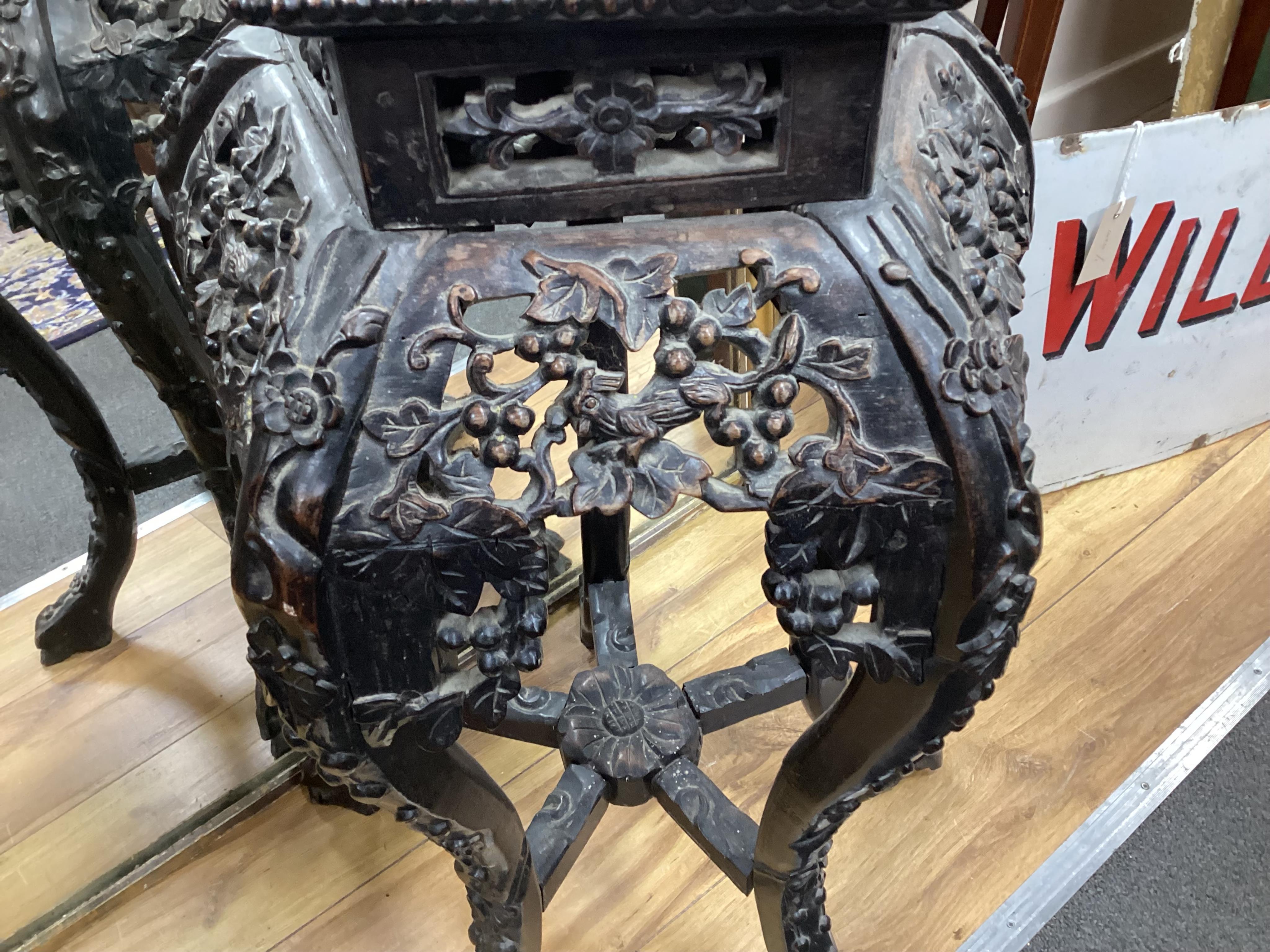 A Chinese rosewood and marble inset stand, late Qing dynasty, 67cm high. Condition - fair